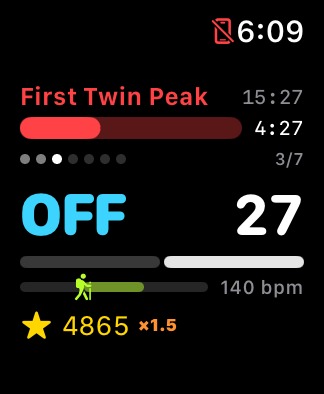 Interval cue screen showing OFF with a 27-second countdown, round dots at 3 of 7, and a green in-zone hiker